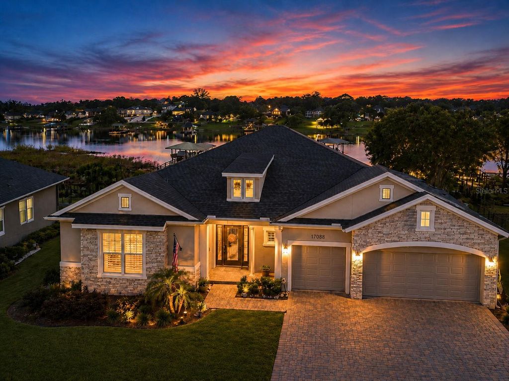 Photo of 17088 Secret Hollow Loop, Clermont, FL 34711 (MLS # O6405582)