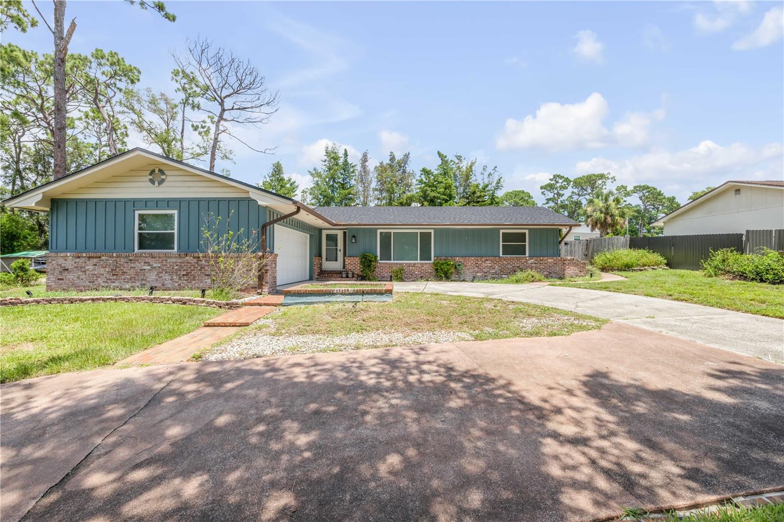 Updated Ranch-Style Home with Pool, Lake Views & No HOA on 1/3 Acre Lot.
This beautifully updated brick ranch sits at the end of a quiet street on an oversized 1/3-acre lot with partial views of Lake Marion. Thoughtfully refreshed with a brand-new roof, fresh interior and exterior paint, updated flooring, modern lighting, stylish window treatments, and high-speed fiber internet, this home is move-in ready and full of charm. Enjoy the recently updated kitchen and baths, along with a spacious layout that includes a flexible bonus space off the laundry room, perfect for storage or hobby use. Outside, a circular driveway welcomes you home, while the fully fenced backyard offers privacy and functionality with a detached storage shed. The screened in in-ground pool and expansive deck make it ideal for relaxing or entertaining year-round. Located just minutes to I-4 and ideally situated between Longwood and Altamonte Springs, this home is zoned for top-rated schools including Altamonte Elementary, Milwee Middle, and Lyman High and comes with no HOA restrictions. Homes like this don't come around often, schedule your private showing today!