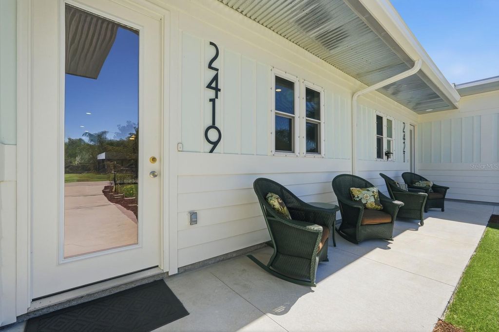 Photo of 2419 India Palm Drive, Edgewater, FL 32141 (MLS # FC316846)