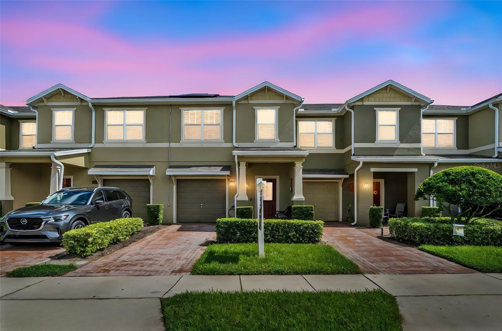 **MOVE IN READY** GREAT LOCATION** LOW HOA** WATER VIEW** Welcome home to this beautifully maintained and thoughtfully upgraded 3-bedroom, 2.5-bath townhome located in the heart of the vibrant and welcoming Sawgrass Plantation community. This two-story townhome offers 1,531 square feet of smartly designed living space, and it shows pride of ownership throughout—from its charming curb appeal and brick-paver driveway to its peaceful backyard retreat.
Step inside to a bright, open-concept layout where natural light pours through large windows, accentuating the stylish blend of finishes. The spacious great room transitions seamlessly into a well-appointed dining area and a chef-inspired kitchen. You'll love the crisp white cabinetry with crown molding, granite countertops, modern tile backsplash, and stainless steel appliances—all complemented by a large breakfast bar perfect for entertaining.
The downstairs features a mix of large polished tile and wood-look ceramic flooring that provides both elegance and durability, with no carpet on the main level. The living area is warm and welcoming with neutral tones and contemporary ceiling fans, while arched walkways and detailed trim give the space a touch of architectural character.
Upstairs, the expansive primary suite offers a private escape with serene pond views, a spacious walk-in closet with a window for natural light and ventilation, and a luxurious en-suite bath featuring dual vanities with granite countertops, a large soaking tub, and a walk-in shower. Two additional generously sized bedrooms, a full guest bath, and a dedicated laundry room with upper storage shelving complete the upstairs living quarters—designed for both comfort and convenience.
Step outside to a beautifully extended brick-paved patio, where lush landscaping and breathtaking water views invite you to relax or entertain with ease. Whether it’s your morning coffee or a peaceful evening under the oak tree canopy, this backyard setting is truly one of a kind.
Located in a well-maintained, HOA-managed neighborhood, this home also includes access to resort-style community amenities: a sparkling pool, clubhouse, playgrounds, tennis and basketball courts, and scenic walking trails—making every day feel like a staycation.
Perfectly situated near Lake Nona’s Medical City, Orlando International Airport, and a variety of shopping and dining destinations, this townhome offers the ideal balance of comfort, connection, and convenience. Whether you're starting a new chapter, growing your family, or seeking a low-maintenance lifestyle, this is your opportunity to live in one of Orlando’s most sought-after communities.
Come see what life at Sawgrass Plantation is all about—and fall in love with where you live.