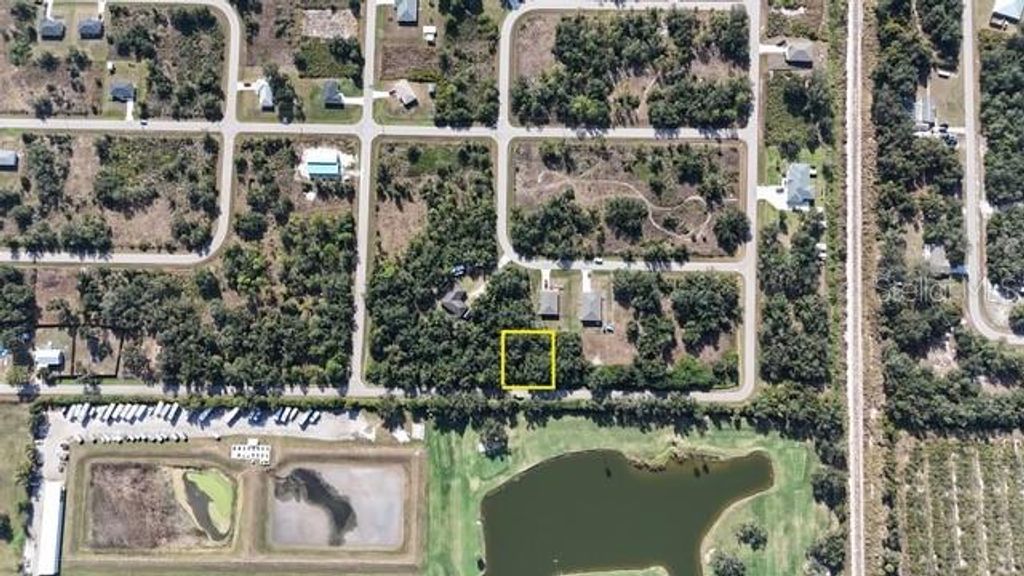 Photo of 29359 Nottingham Road, Punta Gorda, FL 33982 (MLS # OM714623)