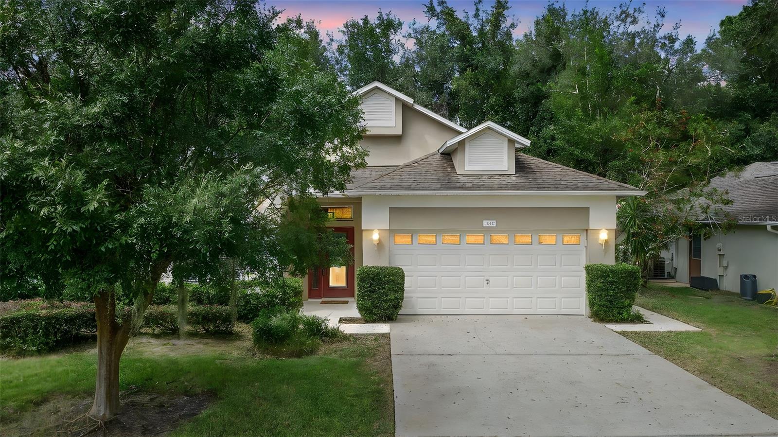 ORANGE CITY: Welcome home to this 3 bedroom 2 bathroom home with over 1600 sq ft. When you enter the home you will immediately notice the high ceilings, easy to maintain Tile flooring and all the natural light that floods the home. The Living room is very spacious and has plenty of room to entertain and sliding doors that lead to the porch. The kitchen features a decorative backsplash and has plenty of counter and storage space. Add a few bar stools for extra seating! Off the kitchen is the dinette area-the perfect spot to enjoy family meals. The Primary suite boasts a ceiling fan, sliding doors to the back porch and an En Suite bathroom with a walk in closet and both a garden tub and walk in shower. Additional bedrooms are spacious and there is a full guest bathroom. Inside utility room with extra shelving and cabinets-makes doing laundry easy! The large screened porch will be your favorite spot to enjoy your morning coffee or wind down after a long day at work. The backyard has private views and you can enjoy nature year round! Low HOA fee! Close to shopping, restaurants and easy commute to I-4. Don't wait! Make your appointment today to see all this home has to offer you!