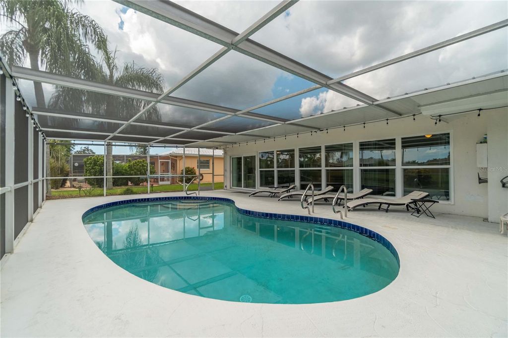 Photo of 33 Caddy Road, Rotonda West, FL 33947 (MLS # A4672266)