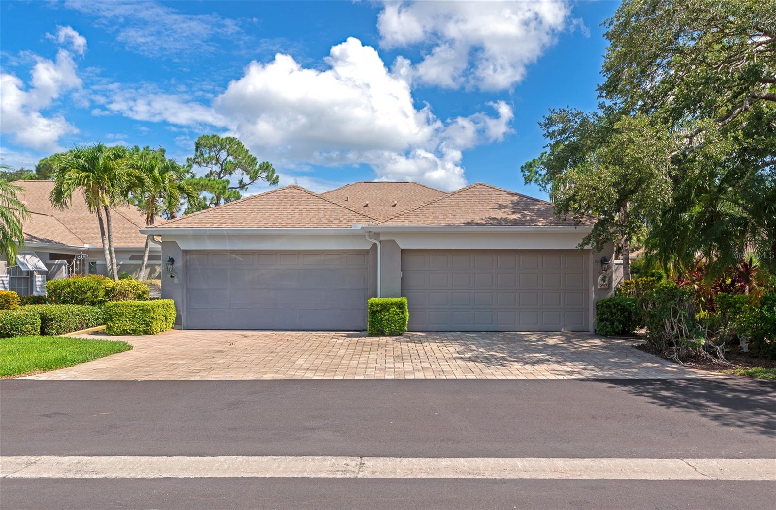 Large Price Reduction. Come experience effortless living in one of Sarasota’s most desirable communities — The Meadows! This beautifully maintained 3 bedroom, 2 bathroom villa in the charming Chambery area is truly move-in ready and offers a lifestyle of comfort, convenience, and connection to nature. As you arrive, you’ll be greeted by lush landscaping, a spacious two-car garage, and an inviting gated front courtyard — the perfect private spot to enjoy your morning coffee or tend to your favorite plants. Step inside and be welcomed by an open, airy layout bathed in natural light thanks to large windows that invite the outdoors in. The living room is both spacious and cozy, centered around a charming fireplace ideal for relaxing evenings at home. The updated kitchen is a chef’s dream, featuring stylish cabinetry, granite countertops, a striking tile backsplash, and sleek stainless steel appliances. A pass-through bar window opens to the dining area, making entertaining both easy and enjoyable. Just off the kitchen, a convenient dry bar and laundry closet help keep daily tasks within easy reach and neatly tucked away. The smart split-bedroom layout ensures privacy for the spacious primary suite, which features a large walk-in closet and a beautifully updated en-suite bathroom with a luxurious walk-in shower. Two additional bedrooms offers plenty of flexibility — perfect for guests, a home office, or a creative space. At the back of the home, you’ll find a gorgeous glass-enclosed bonus room with serene views of the surrounding greenery — ideal for use as a sunny Florida room, plant sanctuary, reading nook, or home gym. Step outside to the rear patio and enjoy a peaceful setting for barbecues, dining under the stars, or simply unwinding with loved ones as the sun sets. Located in the highly desirable Chambery enclave, this villa is part of a well-managed community with an active and welcoming social committee that hosts year-round events, fostering a true sense of neighborhood connection. The Meadows itself is a paradise for outdoor enthusiasts and those seeking a relaxed yet vibrant lifestyle. Enjoy miles of walking and biking trails, scenic lakes, a butterfly garden, playgrounds, and beautifully landscaped open spaces. Just minutes away, the Meadows Shopping Village offers boutique stores, three restaurants, and daily conveniences. For those seeking even more, The Meadows Country Club provides access to world-class amenities including three 18-hole golf courses, 17 Har-Tru tennis courts, a junior Olympic-size pool, a state-of-the-art fitness center, and multiple dining venues. All of this is just a short drive from downtown Sarasota, world-renowned Gulf beaches, cultural attractions, popular shopping, fine dining, and more. Whether you’re seeking an active lifestyle or a peaceful retreat, this villa offers the best of both worlds in a setting that truly feels like home. Don’t miss your chance to be part of this exceptional community — schedule your private showing today!