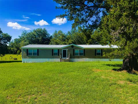 Photo of 21528 NW 209th Terrace, High Springs, FL 32643 (MLS # GC541142)