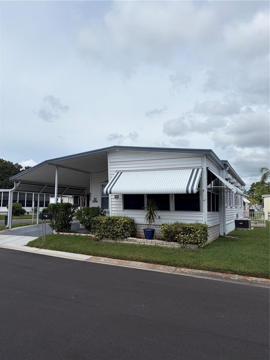 Photo of 10493 Peaceful Drive, Largo, FL 33773 (MLS # TB8555931)