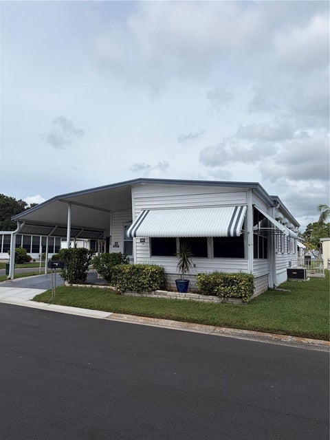 Photo of 10493 Peaceful Drive, Largo, FL 33773 (MLS # TB8555931)