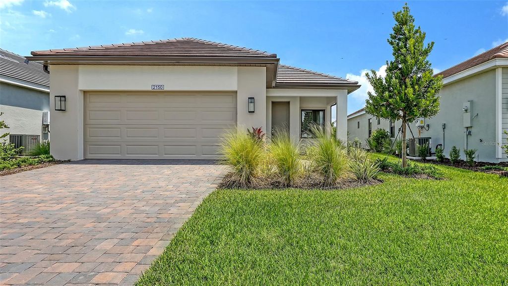 Photo of 2150 Bamboo Palm Cove, Bradenton, FL 34212 (MLS # A4660567)