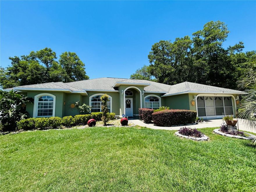 Welcome to this beautifully maintained pool home offering spacious living, vaulted ceilings, and an ideal layout for both everyday comfort and entertaining. Built by Marco Polo Homes, this 3 bedroom, 2 bath residence features an expansive open floor plan along with a versatile front bonus room/den that could easily function as a home office, playroom, media room, or potential 4th bedroom conversion.

From the moment you arrive, you’ll appreciate the inviting curb appeal, mature landscaping, oversized driveway, and fully fenced vinyl backyard that provides both privacy and functionality. Inside, the home showcases soaring vaulted ceilings throughout the main living areas, creating a bright and airy atmosphere filled with natural light. The oversized great room serves as the heart of the home and flows seamlessly into both the formal dining area and separate dinette space, making the layout perfect for entertaining family and friends.

The spacious kitchen offers abundant cabinet and counter space, breakfast bar seating, and overlooks the main living areas and pool area, allowing for easy everyday living and gatherings alike. The split bedroom floor plan provides privacy, while the oversized primary suite offers ample room for a sitting area and features sliding glass doors with relaxing pool views. The primary bath includes dual vanities, a garden tub, separate shower, and private water closet. The guest bathroom conveniently includes direct access to the pool area.

Step outside and enjoy your own private Florida retreat featuring a beautiful screened-in large inground pool complete with a waterfall feature and built in seating area. The covered lanai provides an ideal space for outdoor dining, relaxing, or entertaining year round, while the backyard still offers additional green space outside the enclosure along with a storage shed for tools and lawn equipment. With NO HOA, this property offers added flexibility and freedom for homeowners.

Additional features include tile flooring throughout the home, a dedicated laundry room with utility sink, spacious secondary bedrooms, an attached 2 car garage, irrigation system and plenty of storage throughout the home.

Conveniently located near shopping, dining, parks, golf courses, and everyday conveniences, this home also offers easy access to many of Ocala’s outdoor recreation opportunities and popular local attractions. Combining spacious indoor living with exceptional outdoor entertaining space, this home captures the best of Florida living.
