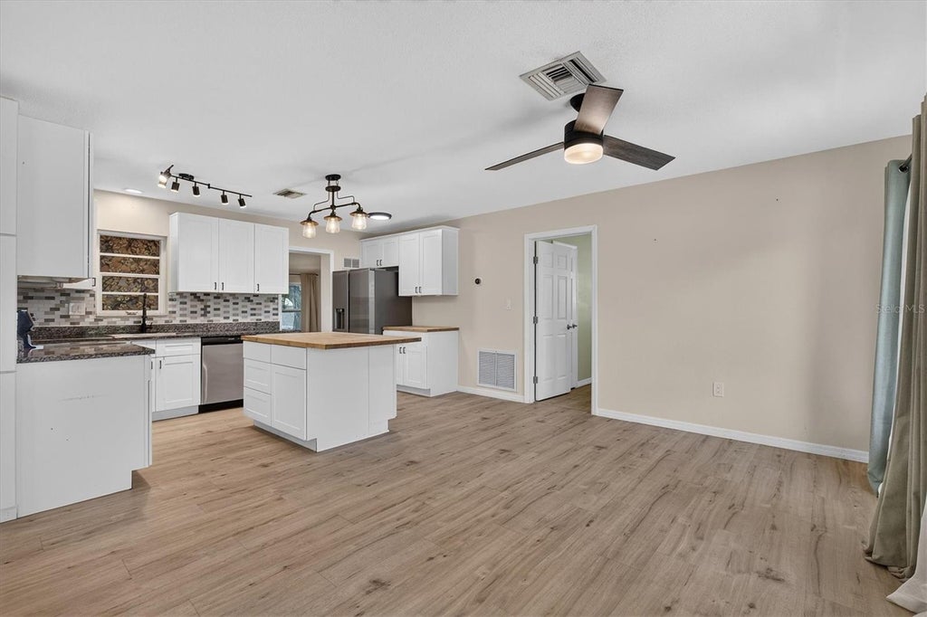 Photo of 715 W Bayshore Drive, Tarpon Springs, FL 34689 (MLS # TB8549015)