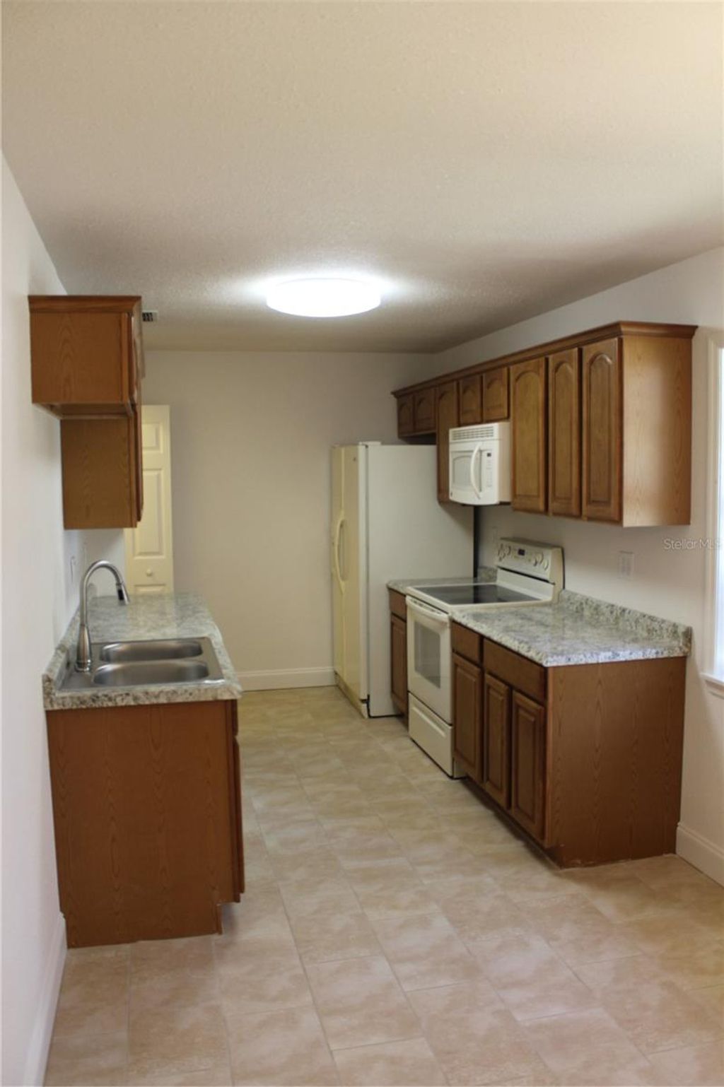 Photo of 220 Hickory Street, Brooksville, FL 34601 (MLS # TB8473254)