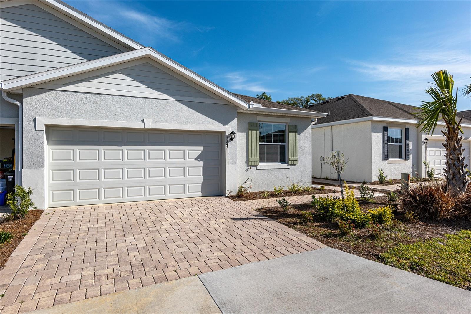 This exquisite 2-bedroom, 2-bathroom villa with a versatile office/den awaits in the prestigious, gated community of Ocala Preserve. Mere
minutes from the World Equestrian Center (built 2023!), this haven boasts unparalleled comfort and style. Upgraded tile flooring graces the main areas, offering a seamless flow and effortless elegance, while plush carpeting in the bedrooms ensures ultimate comfort. Granite countertops throughout add a touch of sophistication, and upgraded hardware and fixtures elevate the space. Smart Home features are ready to enhance your living experience. An open-concept, split floor plan bathed in natural light creates a sense of spaciousness and invites effortless entertaining. The chef's kitchen features an oversized center island, perfect for meal prep or socializing, upgraded soft-close cabinets for a sleek look and quiet operation, a spacious walk-in pantry for all your culinary needs, and a breakfast bar offering additional casual dining options. The expansive primary suite boasts ample space to accommodate a king-size bedroom set, a large walk-in closet for organized storage, and a spa-like en-suite bathroom with stunning views of the backyard. A generously sized second bedroom features plush carpeting, a large closet with ample storage space, and a full guest bathroom with upgraded granite countertops and a shower/tub combination. The versatile office/den offers large privacy doors for a quiet workspace and a spacious walk-in closet that can easily convert to a third bedroom, maximizing flexibility. Unwind and entertain in the inviting great room. Large windows bathe the space in natural light, and luxury tile floors add a touch of elegance. Sliding doors seamlessly connect to the expansive screened lanai, perfect for indoor-outdoor living. The expansive screened lanai provides a tranquil retreat to relax and enjoy the scenic views, offering ultimate privacy with no rear neighbors. Ocala Preserve, a luxury resort-style community, offers an 18-hole championship golf course, a rejuvenating day spa, 21 miles of scenic walking trails, resort-style pools for year-round enjoyment, a delectable on-site restaurant, a state-of-the-art fitness center, tennis and pickleball courts, and much more! The rental rate includes all community amenities, high speed fiber optics wi-fi, pest control, lawn care, trash removal, and water! Located minutes from top equestrian events, shopping, I-75 access, and more, this villa offers an unparalleled lifestyle. Contact us today to schedule your private showing and start living your Florida dream!