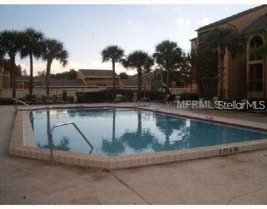 Photo of 2031 Cascades Boulevard #103, Kissimmee, FL 34741 (MLS # O6370059)