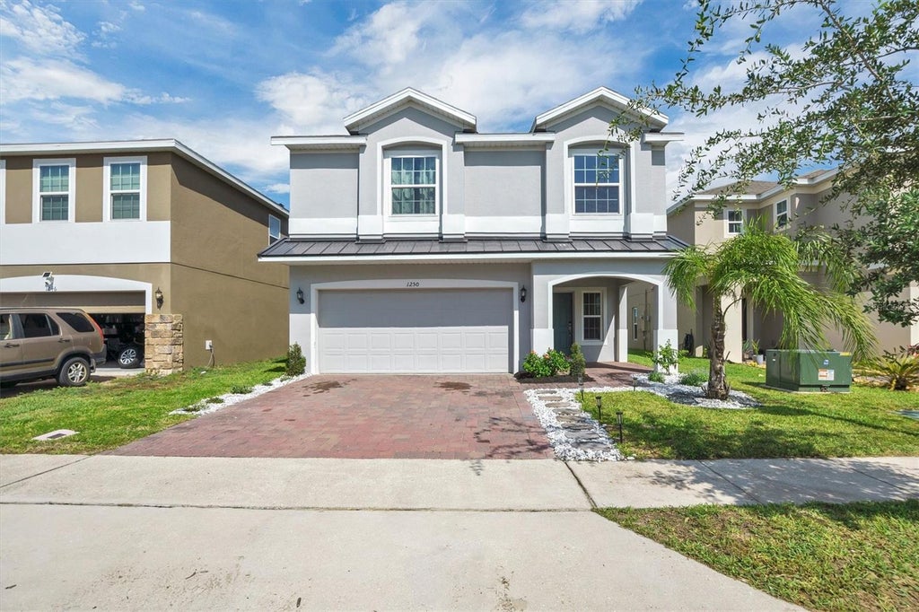 Photo of 1250 Island Slough Lane, Davenport, FL 33837 (MLS # P4939640)