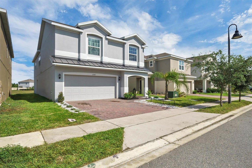Photo of 1250 Island Slough Lane, Davenport, FL 33837 (MLS # P4939640)