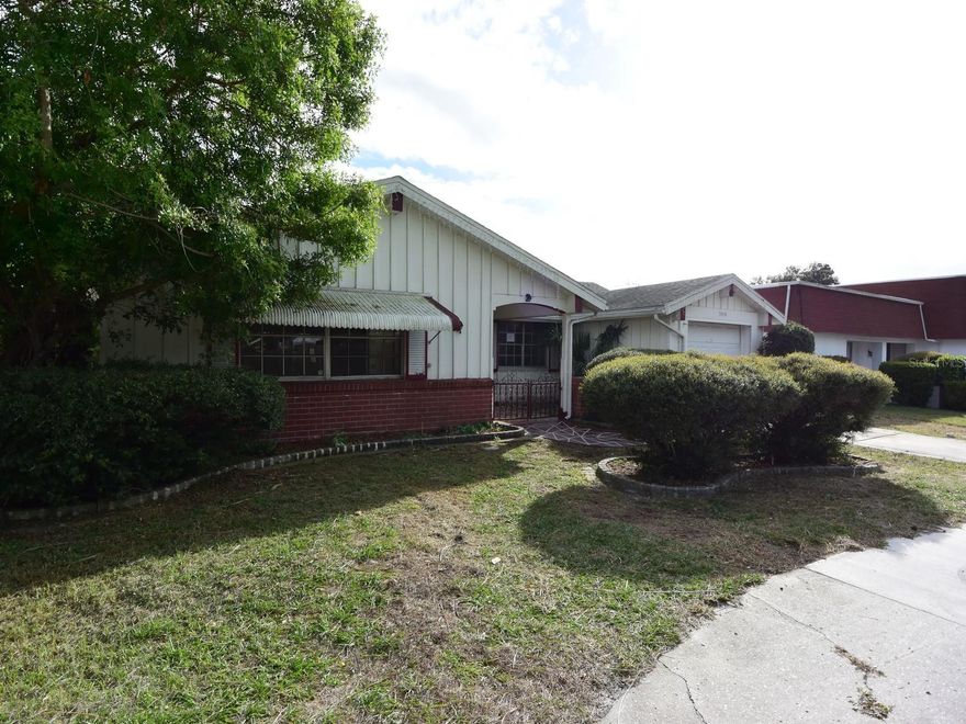 *** Multiple Offers *** Highest & Best Offers are due by 1:00 pm on 11/15/2023 *** 3/2/1 located on a tranquil pond in beautiful Holiday Florida. The home is a true 3 bedroom and has a nice layout. All of the room are spacious. There are water views of the lovely pond from the primary bedroom, FL room, kitchen, and the glass enclosed porch. The roof is eight years old and the HVAC A/C is four years old. There is a newer wood deck in the back your to enjoy the nature abounds. The subject soes need some TLC but is well worth the money. Come and take a look before it's gone!! *** This property may qualify for Seller Financing (Vendee). Property was built prior to 1978, Lead Based Paint Potentially Exists.*** Due to condition, the property may have health/safety risk(s). Prior to entry / access, all parties must sign a Hold Harmless Agreement and the property may only be shown by appointment. ***