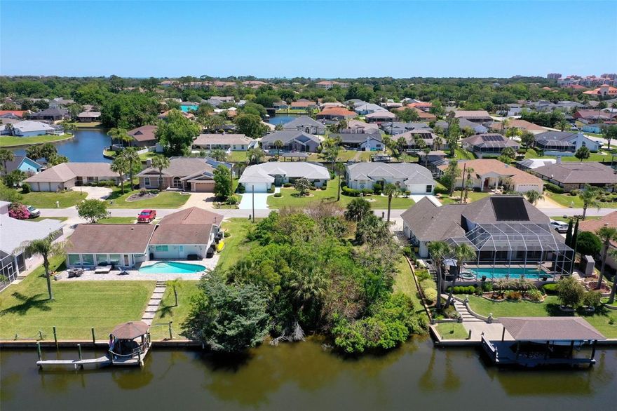 Don't miss this opportunity to own an amazing 80 ft wide saltwater canal lot tucked mid canal location with western rear exposure on a nice cul-de-sac street and surrounded by beautiful homes. Located in Florida's Northeast coast between historic St. Augustine and world-famous Daytona Beach, this property provides a short boat ride to the intracoastal waterway/ Matanzas River and easy access to the Atlantic Ocean via Matanzas Inlet-St. Augustine ( North) or via Ponce Inlet- South of Daytona Beach. Your water trips with stunning sightseeing await. Conveniently located just a short drive to the Island Walk Shopping Center ( 3 mi), 1 mile to the shops and restaurants in European Village, 2 miles to Palm Harbor Golf Course and only 3.3 miles to the beach! Near by walking/ biking trails. No HOA or CDD fees, no required time frame to build and you may choose your own builder to build your waterfront dream home. Do not wait as these 80 ft wide waterfront properties are increasingly fewer and limited!