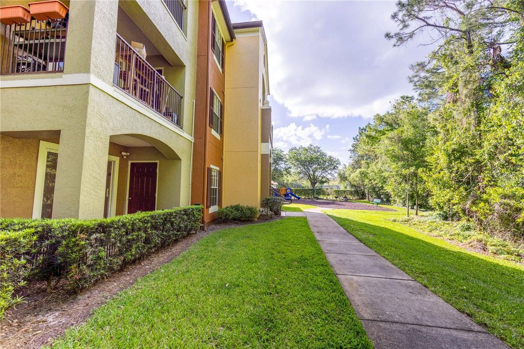Photo of 738 Crest Pines Drive #714, Orlando, FL 32828 (MLS # O6400237)