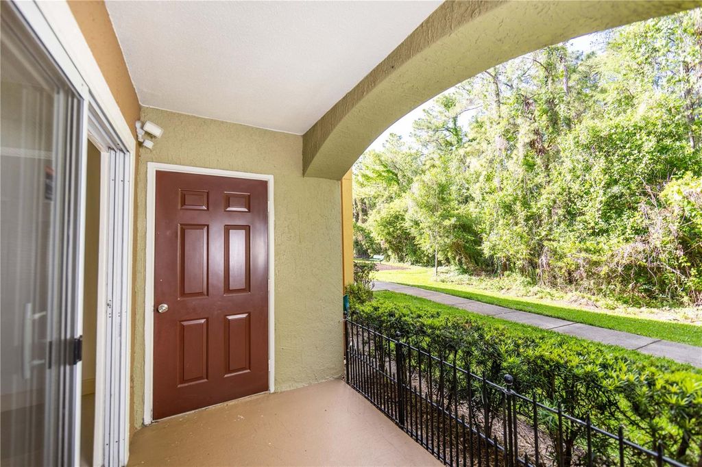 Photo of 738 Crest Pines Drive #714, Orlando, FL 32828 (MLS # O6400237)