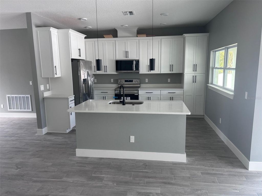 Photo of 509 N Duss Street, New Smyrna Beach, FL 32168 (MLS # O6379566)