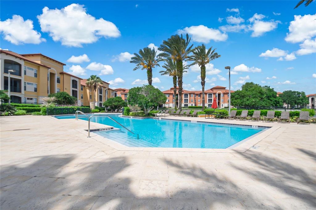 Photo of 6157 Metrowest Boulevard #202, Orlando, FL 32835 (MLS # O6399221)