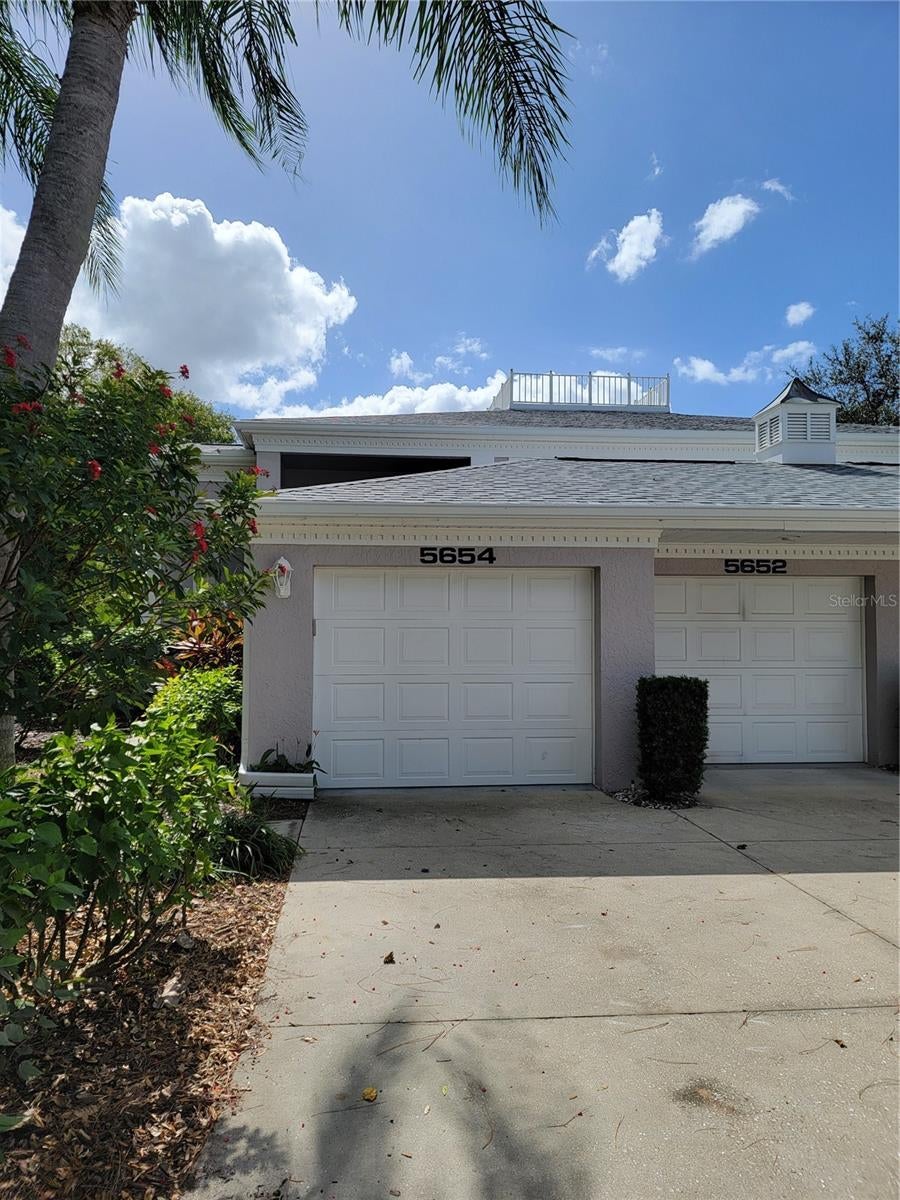 Photo of 5654 Sheffield Greene Circle #28, Sarasota, FL 34235 (MLS # A4710801)