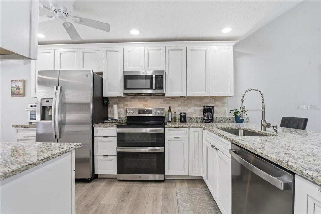 Photo of 3272 Lori Lane #3272, New Port Richey, FL 34655 (MLS # TB8559453)