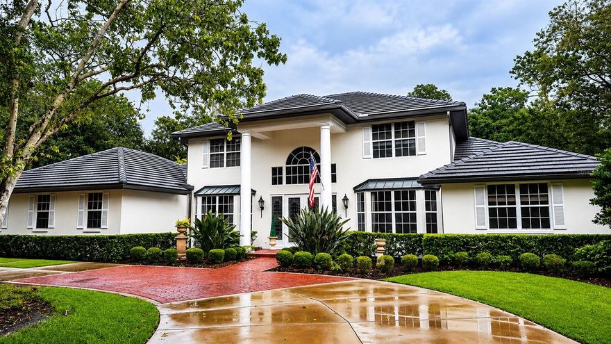 Welcome to this stunningly renovated Gem. One of the Crown Jewels of Laurel Oak Country Club where Golf Membership Optional but buying this home brings you to front of line . Lot personally chosen by Laurel Oak Developer as family home. 2 Master Suites Elegant High end UPGRADES  Real Hickory Wood Floors Newly renovated Kitchen featuring Sub Zero, Miele, BlueStar & Thermador Appliances & Marble countertops & island . Remodelled Master Bath Feature His & Her toilets , his & her sinks and Large shower. A Formal English Garden will uplift your Spirits features Green walls , Antique Brick , Fountain and Fruit Tree's Lemon, Fig Plum as well as Custom Arbors. Sellers added gorgeous Creek with 3 waterfalls & Pond which you can enjoy from the new authentic Clay Paver Patio. Grand & Spacious home has so many features incl bonus heated/cooled crafting and storage room in garage.  Sellers added Generator & 1000 Gal in ground tank for Hurricane Peace of Mind . New Gutters incl Copper across front of home. New Attic insulation. Most doors/windows/sliders are New and are Impact. Main A/C NEW in  2025, other 2 NEW in 22 + 23. New Epoxy Garage floors . Whole House Water Filtration + UV sanitizer. UV Halo Ozonator is part of New Pool equipment. Safety Fence  added around Pool. Seller's planted Lychee, Grapefruit, Navel Orange, Banana & Mango. New Lg Chandliers in Foyer & Masterbath. Most Fixtures/Fans/Lights upgraded incl Perrin & Rowe Bridge Faucet & Restoration Hardware in Masterbath .  Brick Floors installed in Sunroom. Fireplace rebuilt with Taj Mahal Marble & Paneled Wall surrounding it. Roof 2019. Views from inside the Home incl Creek, Formal Garden & Golf Course . 2nd Floor balcony for private sunbathing with custom SunShade added! Homes unique position gives it incredible privacy. Walkways added to make it EZ to meander the almost 1 Acre Paradise . Home on Par 4 Jones Course. New Landscape Lighting placed everywhere to create nightime MAGIC . Other extra's in this incredible 5 bedroom home incl renovated Butler’s Pantry , Shower in laundry Rm with New plank floors is great for pets ,lots of closets + storage .  Outdoor kitchen with newer grill. Sink and granite counters. Come see this fortress of comfort & Style and make it your new home. Expenses were not spared here Upgrade list attached