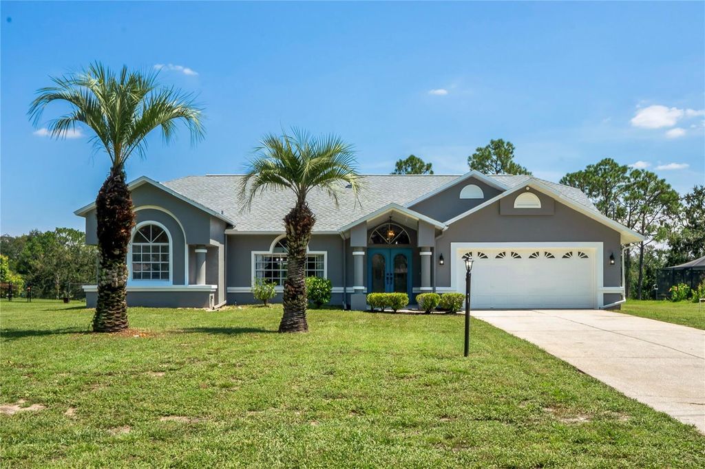 Photo of 1418 Meadow Lark Road, Spring Hill, FL 34608 (MLS # W7878541)