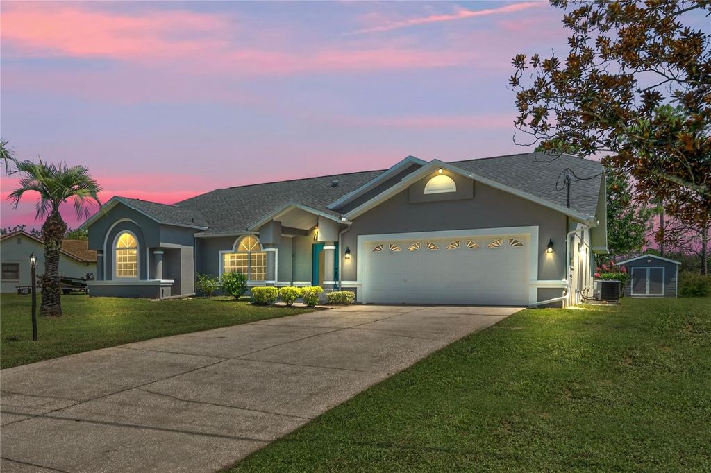 Photo of 1418 Meadow Lark Road, Spring Hill, FL 34608 (MLS # W7878541)