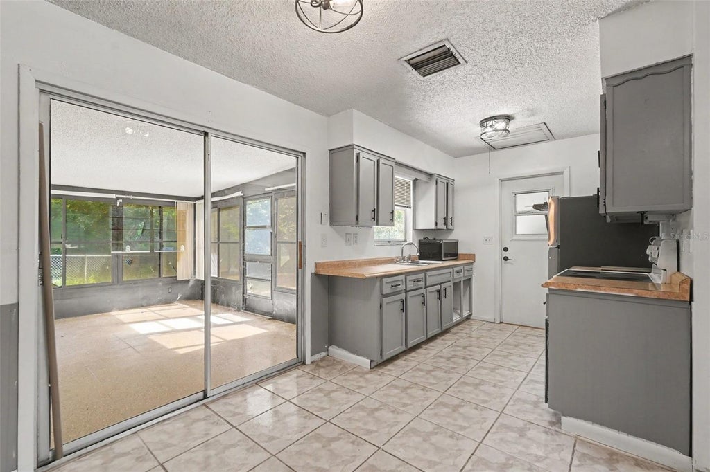 Photo of 9661 Langan Street, Spring Hill, FL 34606 (MLS # TB8546848)