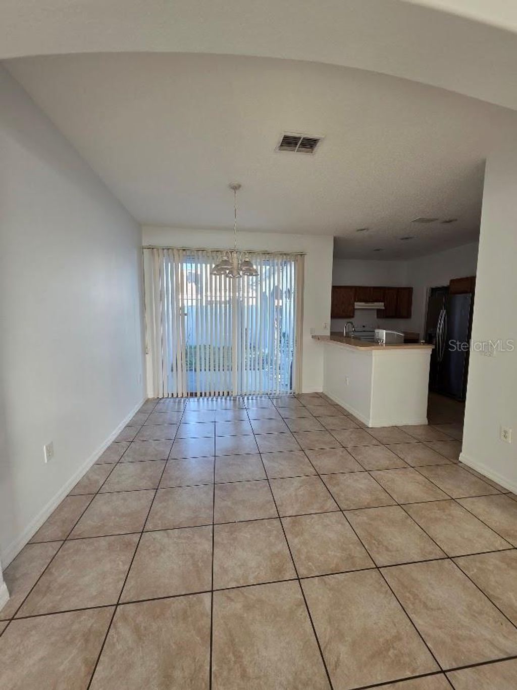 Photo of 1879 Island Walk Drive, Orlando, FL 32824 (MLS # S5144015)