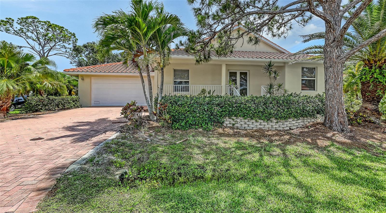 West of the Trail in Nokomis, ready to move in! This geourgeous 3 bedroom, 2.5 bath home features a nice saltwater pool and spa with a huge all paver lanai, perfect for entertaining. It also offers a peek-a-boo view of the lake from the pool area. The large windows throughout the home provide lots of natural light, coupled with 9.5' ceilings. It's located in the small West of Trail community of Sorrento Cay. This home offers also a gas tankless instant water heater, gas dryer hook up and gas pool heater. Matching granite countertops in kitchen and all baths, stainless steel appliances in kitchen, 16" ceramic tiles throughout the main living space, hallway and powder bath. Schedule your private tour today!