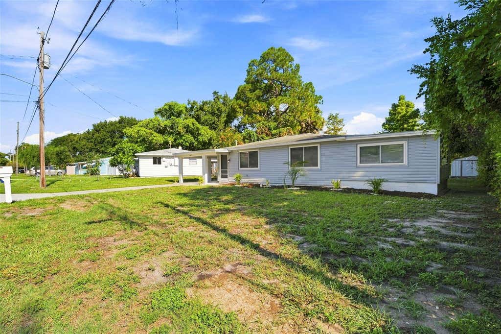 Photo of 660 Dexter Drive, Dunedin, FL 34698 (MLS # TB8542827)