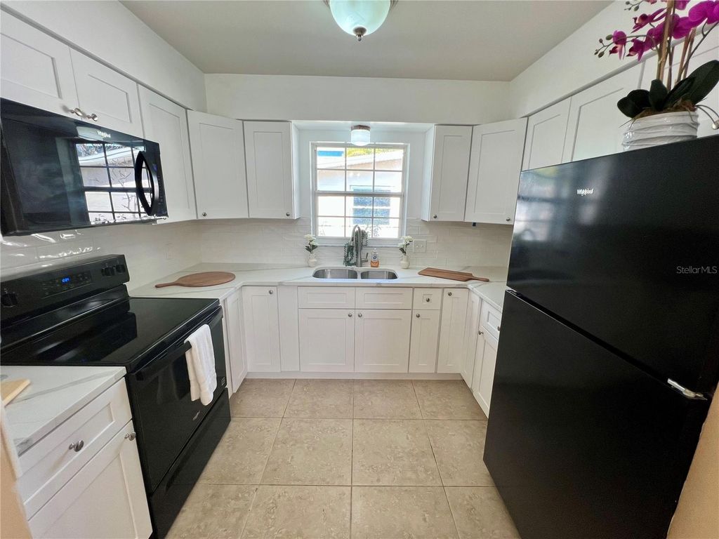 Photo of 11315 3rd Street E, Treasure Island, FL 33706 (MLS # TB8468697)