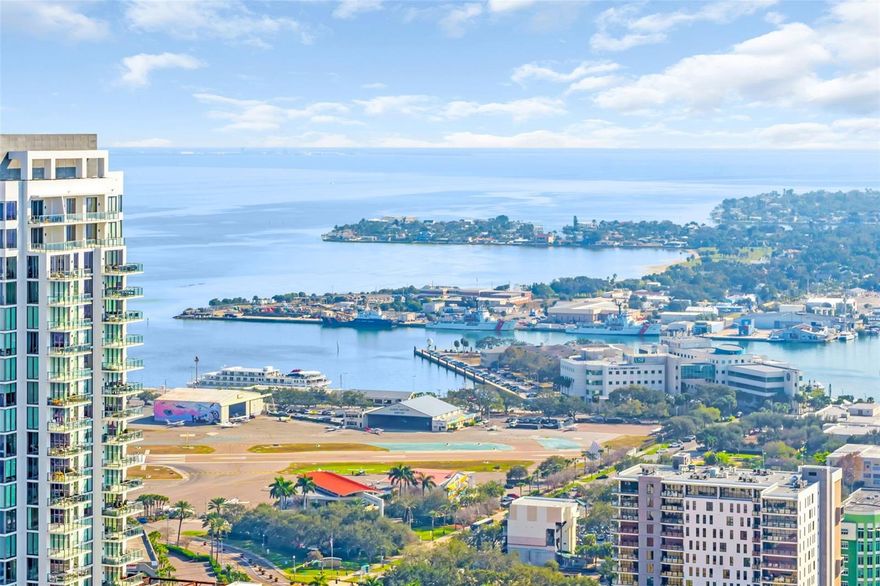 Welcome to refined waterfront living at Arthouse, a newly completed luxury residence in the heart of downtown St. Petersburg. Thoughtfully enhanced with electrical upgrades and designer finishes from the Sable Collection, this elegant home offers 1,935 square feet of interior living space, complemented by an oversized 320-square-foot terrace, for a total of 2,255 square feet of beautifully integrated indoor-outdoor living.

This 2-bedroom, 3 full bath residence with a dedicated den is designed for both elegance and flexibility. The open floor plan is framed by floor-to-ceiling windows, allowing abundant natural light to pour in while showcasing direct east-facing views over the sparkling waters of Tampa Bay, the downtown waterfront, and the iconic St. Pete Pier. Wake each morning to stunning sunrises that set the tone for coastal city living at its finest.

The spacious living and dining areas flow seamlessly to the expansive terrace-ideal for entertaining, relaxing, or simply soaking in the ever-changing waterfront backdrop. Each bedroom offers comfort and privacy with spa-inspired baths, while the den provides the perfect space for a home office, media room, or guest retreat.

Located just steps from world-class dining, arts, shopping, and the vibrant downtown St. Pete waterfront, this exceptional Arthouse residence delivers a rare combination of new construction luxury, thoughtful design, and unforgettable views-all in one of the city's most coveted locations.