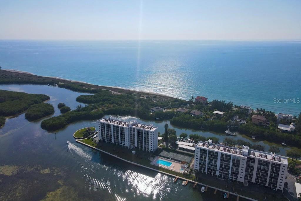 SELLER FINANCING,, Call for details. Seller will pay all Special Assessment remaining. Experience unparalleled island living at The Pointe, a gated waterfront community at Siesta Key’s southernmost tip. This beautifully updated 1-bedroom, 1-bathroom condo boasts breathtaking bay and Intracoastal views, offering the perfect blend of tranquility and modern convenience.
The open-concept layout is enhanced by sleek flooring and a contemporary kitchen with updated appliances and stylish finishes. A spacious lanai, accessible from the living area and bedroom, provides the ideal spot for morning coffee or evening relaxation while soaking in picturesque water views. Ample storage and in-unit laundry add convenience to this thoughtfully designed space.
The Pointe offers an array of resort-style amenities, including a heated pool, spa, sauna, and fitness center. Enjoy friendly matches on the lighted tennis and pickleball courts, or take advantage of private boat docks and a dedicated kayak launch for easy access to the surrounding waters. Residents enjoy deeded beach access, just a short walk to the beach. Boater? Dock access is only $100/month on a first come, first serve basis. A great value for boat owners, The clubhouse and outdoor pavilion with BBQ grills make entertaining effortless.
One of the most exciting aspects of this location is the recent reopening of Midnight Pass, restoring the natural water flow between the Gulf of Mexico and the Intracoastal Waterway. This revitalization has improved water clarity and marine life, making this area even more desirable for boating, fishing, and water sports enthusiasts.
Just minutes away, Turtle Beach offers pristine sands and tranquil Gulf waters, while nearby Siesta Key Village provides a variety of dining, shopping, and entertainment options. Whether seeking adventure or relaxation, this vibrant community has it all.
Furnishings optional, this stunning residence is move-in ready. Don’t miss the opportunity to own a piece of paradise in one of Siesta Key’s most sought-after waterfront communities. Experience the beauty, convenience, and coastal charm of The Pointe—your perfect island retreat awaits!