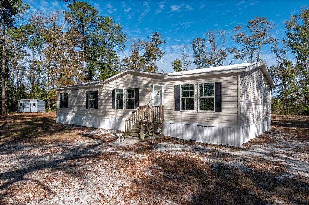 Photo of 20606 NE 51st Lane, Earleton, FL 32631 (MLS # GC537079)