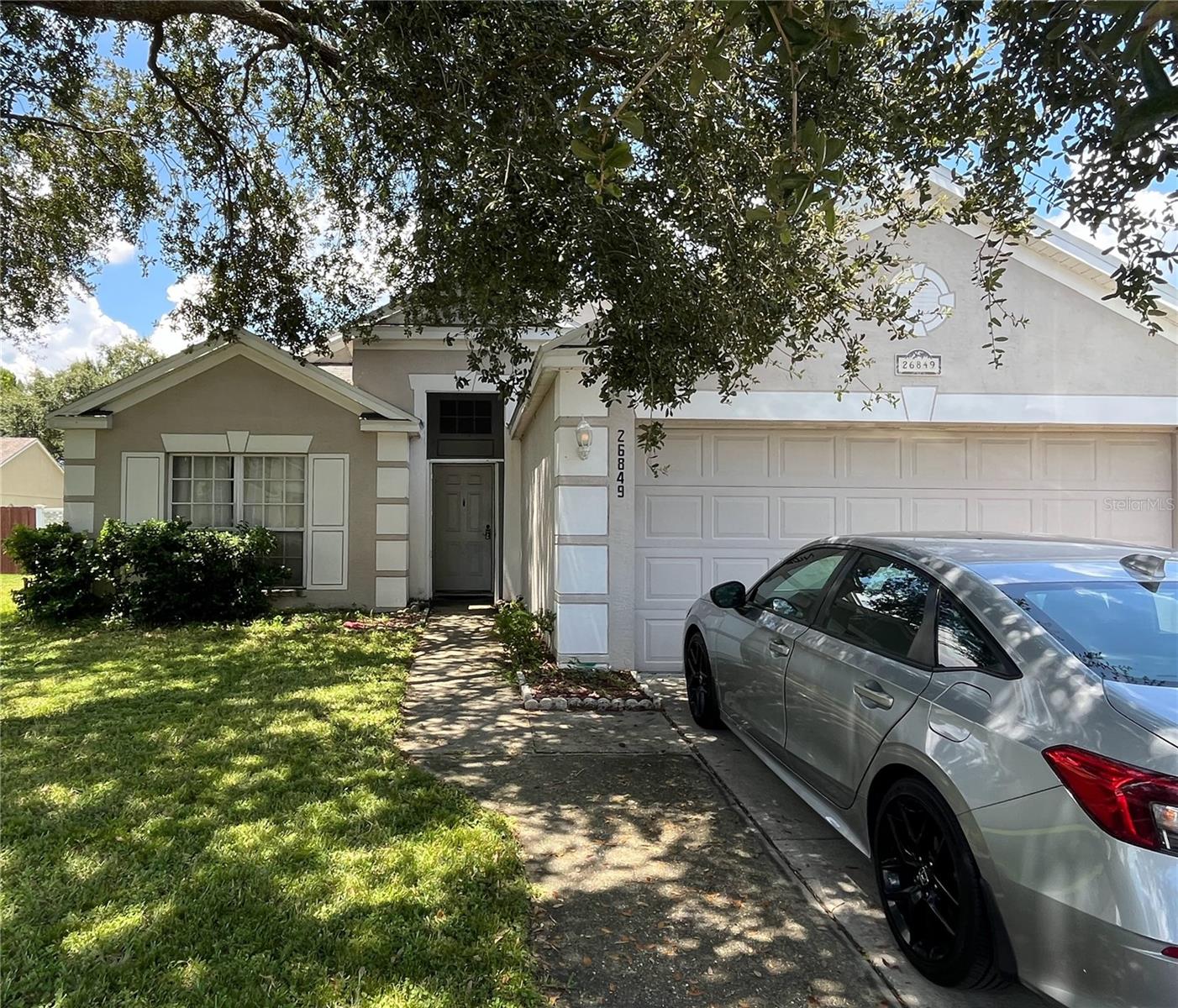INVESTOR SPECIAL - CASH ONLY – Quail Hollow Village, Lutz. This 4 bedroom, 2 bathroom block home with 1,685 sq. ft. is a prime fix-and-flip, buy-and-hold, or make it your own opportunity in the sought-after Quail Hollow Village community of Lutz. Major ticket items are already taken care of: Roof (2016), A/C (2017), and water heater (6 months old). With the big systems handled, you can focus on updating cosmetics and maximizing value. The home sits on a good-sized lot with a fully fenced backyard, offering strong appeal for future buyers or renters. The layout provides excellent potential for a modern open-concept design or rental-friendly updates. Quail Hollow Village is centrally located near I-75, shopping, dining, and top-rated schools, making it a high-demand rental and resale area. **Cash only.** Bring your vision, update the cosmetics, and realize the upside. Perfect for investors looking for their next profitable project in a thriving Lutz location.