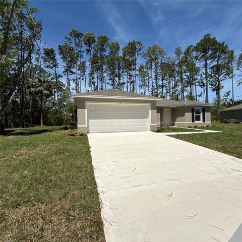 Photo of 131 Palmwood Drive, Palm Coast, FL 32164 (MLS # C7508723)