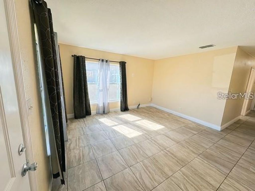 Photo of 7618 Arezzo Avenue, Orlando, FL 32819 (MLS # O6391865)