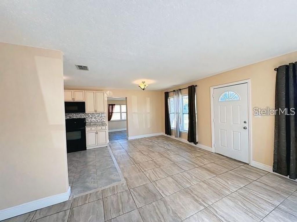 Photo of 7618 Arezzo Avenue, Orlando, FL 32819 (MLS # O6391865)