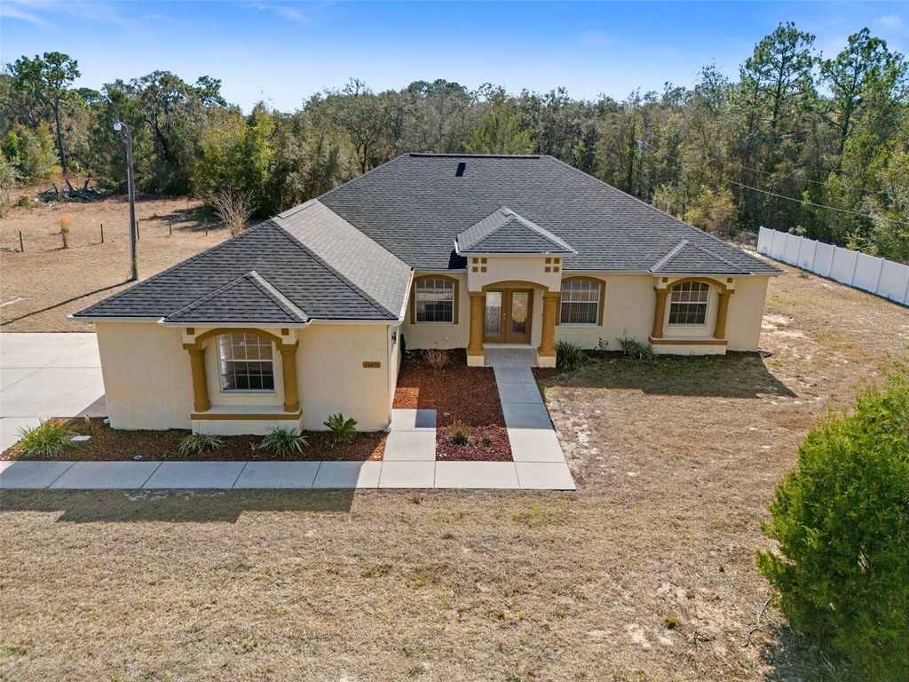 Photo of 16870 Akins Drive, Spring Hill, FL 34610 (MLS # W7882268)