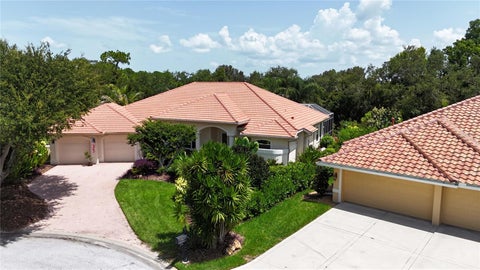 Photo of 4791 Hanging Moss Lane, Sarasota, FL 34238 (MLS # A4701941)