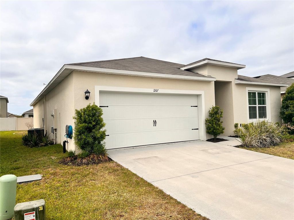 Photo of 1267 Iguana Loop, Davenport, FL 33897 (MLS # O6406726)