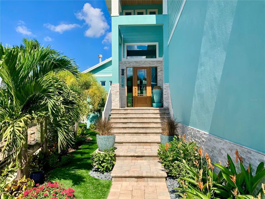 Waterfront Sanctuary on Palm Island 

Welcome to an unparalleled blend of sophistication and coastal charm. Nestled on the exclusive Palm Island neighborhood of Siesta Key, this exquisite residence offers an extraordinary island lifestyle—perfectly positioned along the Grand Canal with close proximity to the pristine, sand Beach of Siesta Key and the vibrant energy of Siesta Village.
 
Spanning close to 3,500  square feet of meticulously designed living space, this newly built, custom home provides the ultimate in luxury and island living. The home includes 4 bedrooms, 4 full bathrooms, plus 2 additional half baths. Enjoy an additional, comfortable family room on the second floor. Every detail has been carefully curated to create a seamless balance of form and function. From the moment you enter, you'll be captivated by the open-concept layout, soaring ceilings, and walls of glass that flood the home with natural light, offering breathtaking panoramic views of the  Grand Canal, playful manatees, water birds, and lush tropical landscapes. The chef-inspired kitchen is a culinary dream, featuring top-of-the-line Thermador appliances, custom cabinetry, and an expansive, Quartzite island perfect for both cooking and entertaining. The spacious living and dining areas flow effortlessly into the outdoor oasis, where a resort-style pool, hot tub, gas fire pit and outdoor kitchen await. Whether you're hosting guests or simply enjoying a quiet evening, this home offers the ideal setting for any occasion. The first floor primary suite is a true retreat, with ship lap ceiling and accent wall and a spa-like bathroom that includes a walk-in shower and dual vanities. Each additional bedroom/en-suite has been designed with comfort and luxury in mind, providing private, serene spaces for family and/or guests. In addition to the gorgeous interior, the property offers 80 feet of water frontage and unrivaled outdoor amenities including a private dock with 10,000 lb. boat lift ideal for boating enthusiasts to access Sarasota Bay and beyond. 

Situated just moments from the world-famous Siesta Key Beach, Iconic Siesta Village, and the vibrant downtown Sarasota scene, 262 
Island Circle is the epitome of coastal, waterfront living. This is more than a home—it's an island lifestyle. This magnificent residence offers the perfect fusion of luxury, tranquility, and location. Discover your own slice of paradise on Siesta Key today. Call for a private showing.