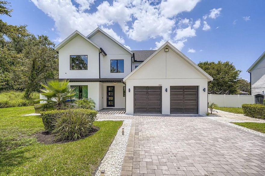 Absolutely Stunning Modern Home with No HOA on Nearly Half an Acre! Welcome to 1882 Lake Pearl Dr in the charming town of Gotha, an exquisite 4-bedroom, 3.5-bath single-family home that perfectly blends modern design with comfortable living. Built in 2021, this property has been meticulously maintained by its original owners and sits at the end of a quiet dead-end street with no through traffic, offering the ultimate in privacy. Inside, you’ll find beautiful fully upgraded flooring, unique wall panels, and a chef-inspired kitchen with elegant custom cabinetry, Quartz Countertops, and a beautiful wine cellar. The open layout is bright and inviting, designed to seamlessly accommodate both daily living and entertaining. The home features four spacious bedrooms and three full bathrooms, along with a convenient half bath, providing plenty of space for family and guests. Step outside to enjoy the absolutely gorgeous pool and an expansive lot of nearly half an acre. Only half of the property is cleared, offering endless potential for expansion, gardening, or creating your dream outdoor oasis. With no HOA, elegant curb appeal, and a modern architectural design, this property is truly a rare find.