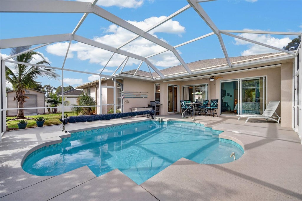 Photo of 3960 Log Cabin Road, North Port, FL 34291 (MLS # C7532631)