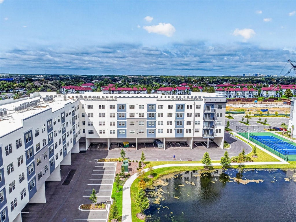Photo of 5563 Millenia Park Blvd #517, Orlando, FL 32839 (MLS # O6445955)