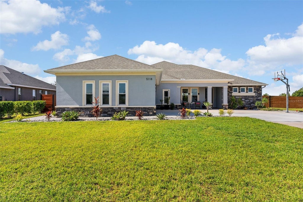 Photo of 5118 Lake Toscana Drive, Wimauma, FL 33598 (MLS # TB8549969)